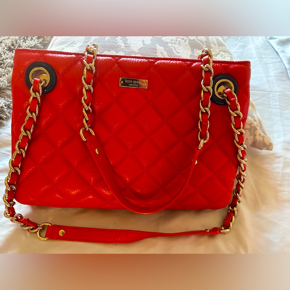 Kate Spade soft leather quilted handbag. Color- coral